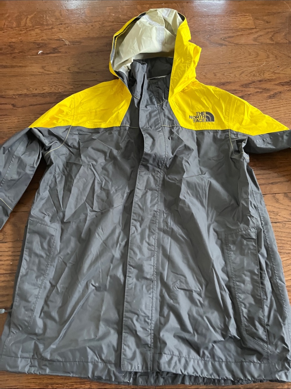 The North Face boys lol Yellow and Gray Hooded Raincoat